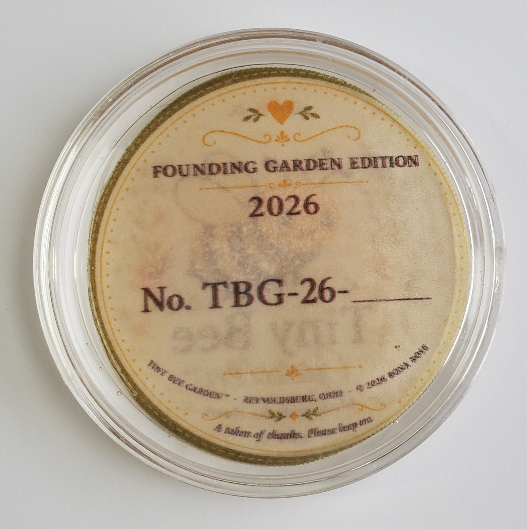 Back of the Founding Garden Edition 2026 token with its number field